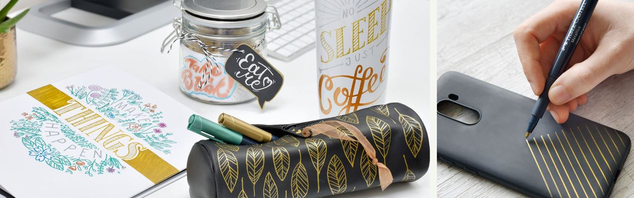 Metallics in a pencil case embellished in gold next to a smartphone case getting painted with a gold metallics pen.